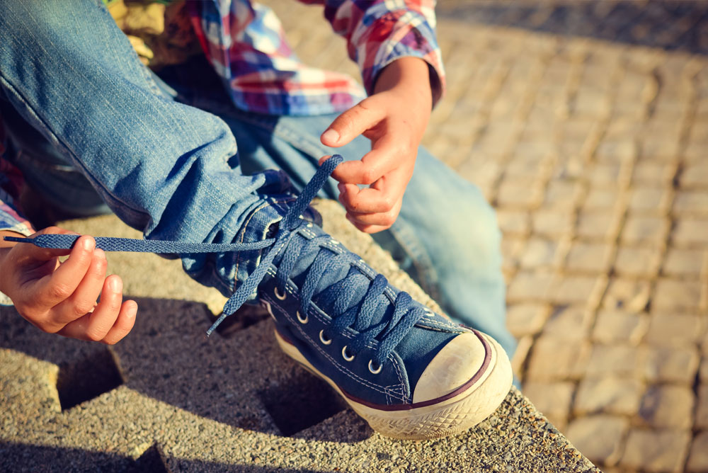 Selvstendighet - lære å knytte skoene